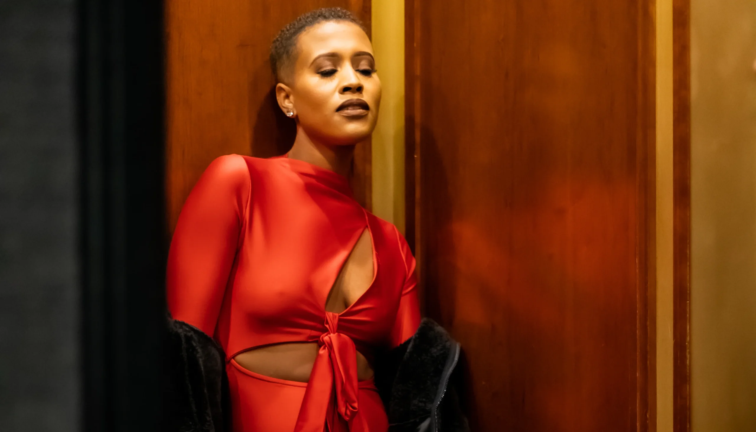 dixon munro in red satin outfit for bad fashion music video behind the scenes